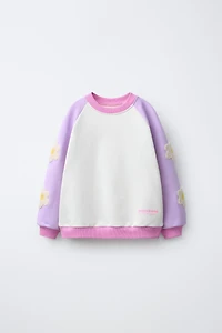 CONTRASTING SLEEVE FLORAL SWEATSHIRT