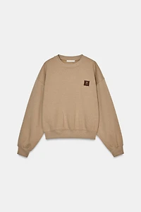 PATCH SWEATSHIRT