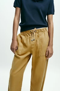 JOGGER PANTS WITH BUTTONED HEM