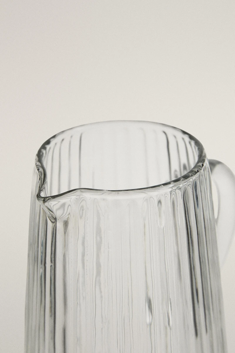 FACETED RAISED DESIGN GLASS PITCHER
