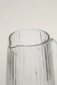 FACETED RAISED DESIGN GLASS PITCHER