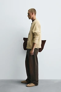 DISTRESSED RIBBED CARDIGAN