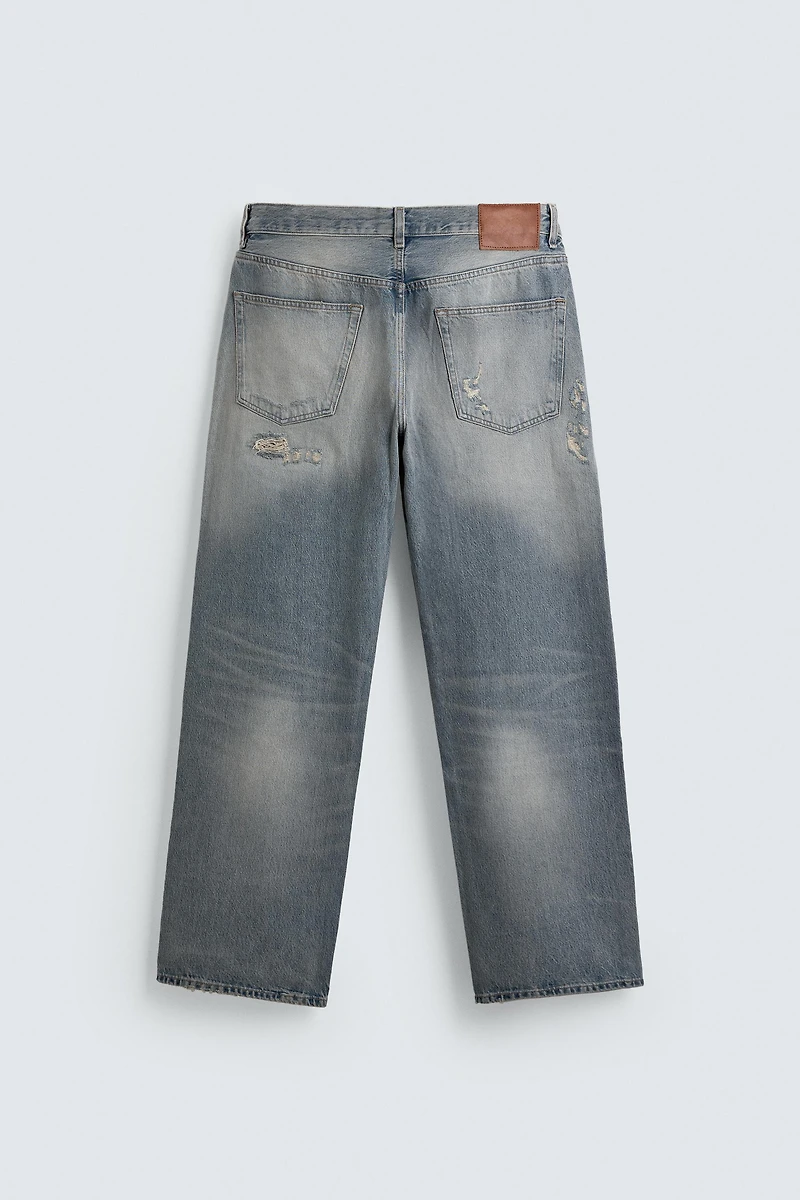 LOOSE FIT RIPPED JEANS