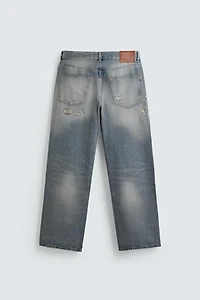 LOOSE FIT RIPPED JEANS