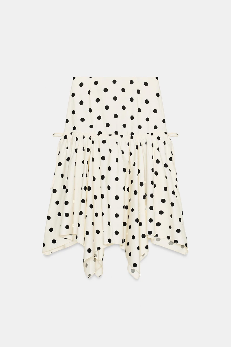 JUPE MI-LONGUE ASYMÉTRIQUE À POIS