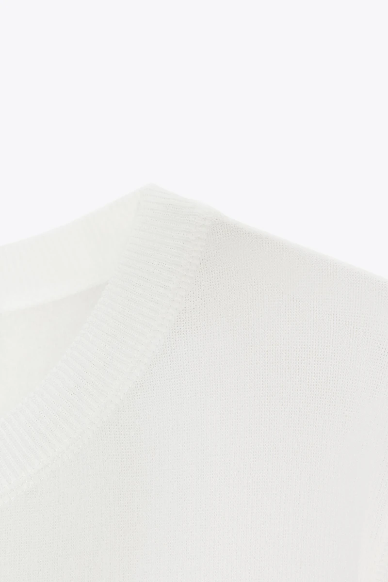 TOP EN MAILLE MANCHES COURTES