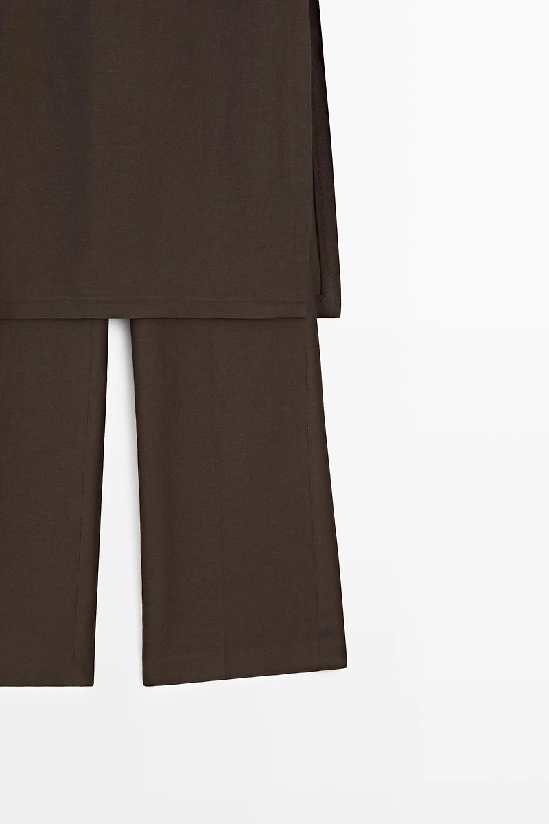 Flowing trousers with skirt detail