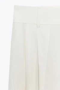 PLEATED PANTS WITH FLAPS