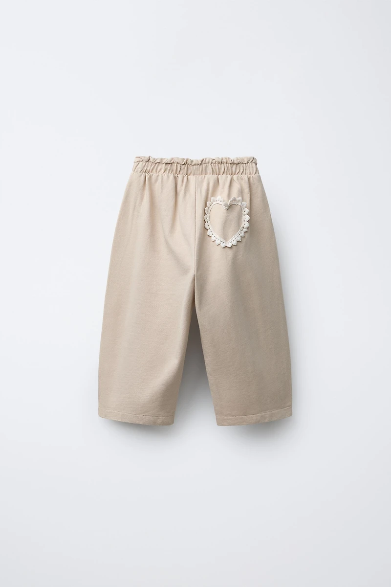 PANTALON BAGGY DÉTAIL CROCHET