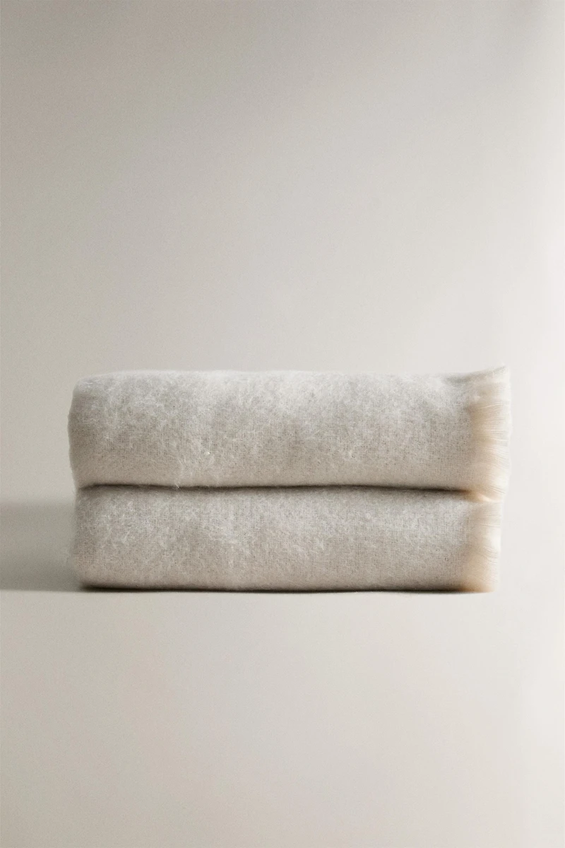 PLAID DOUX À FRANGES