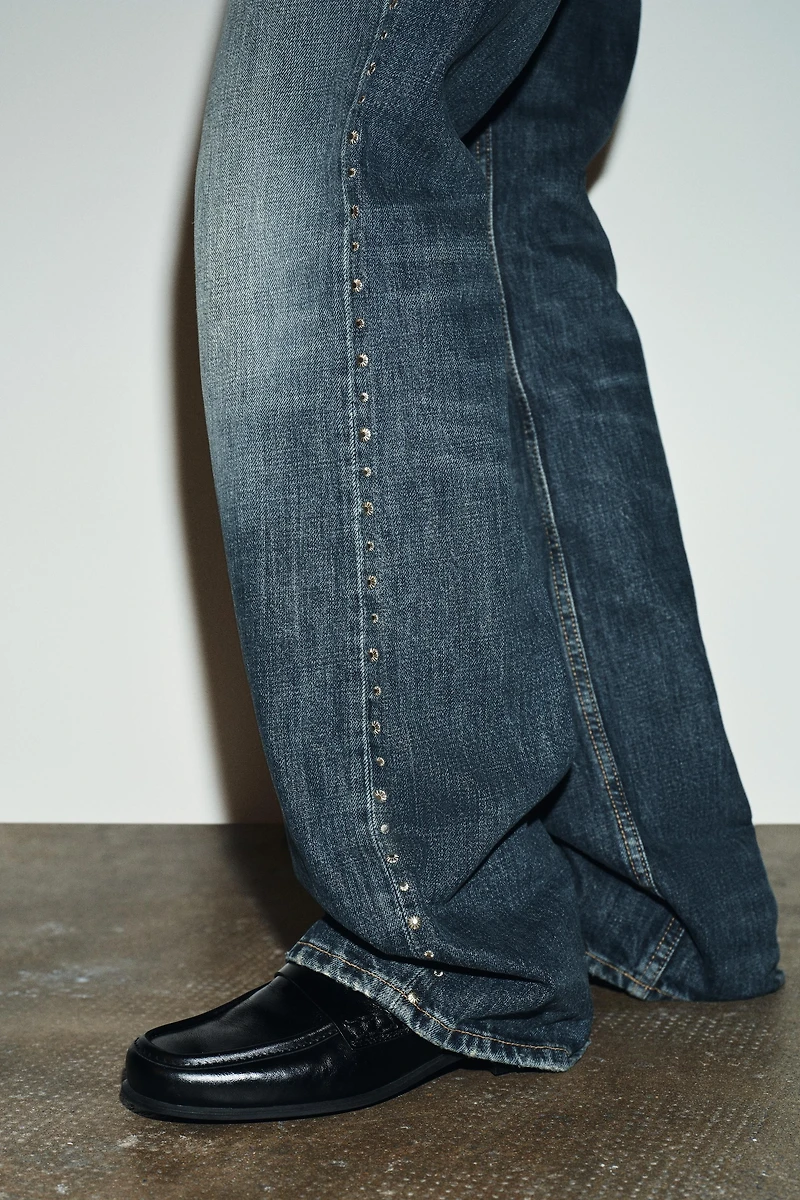 TRF SLUNG LOW-RISE STUDDED JEANS