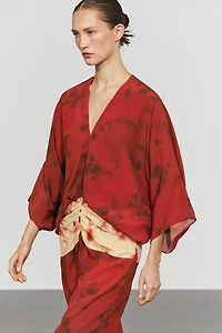 Printed flowing dress with sash detail