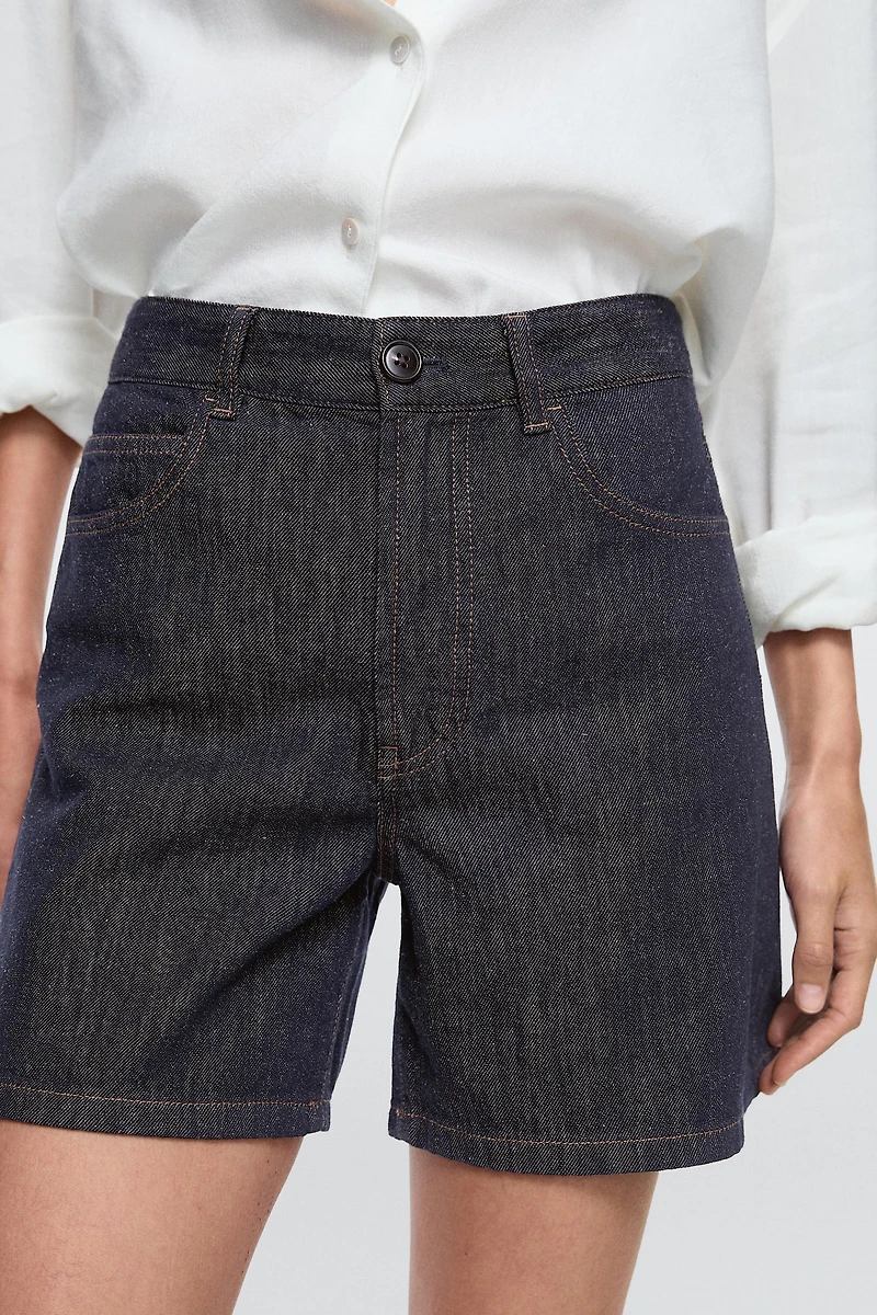Total look mid-rise denim Bermuda shorts