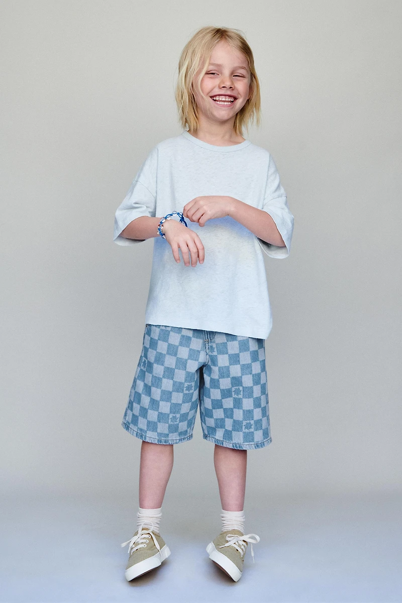 CHECKERBOARD DENIM SHORTS