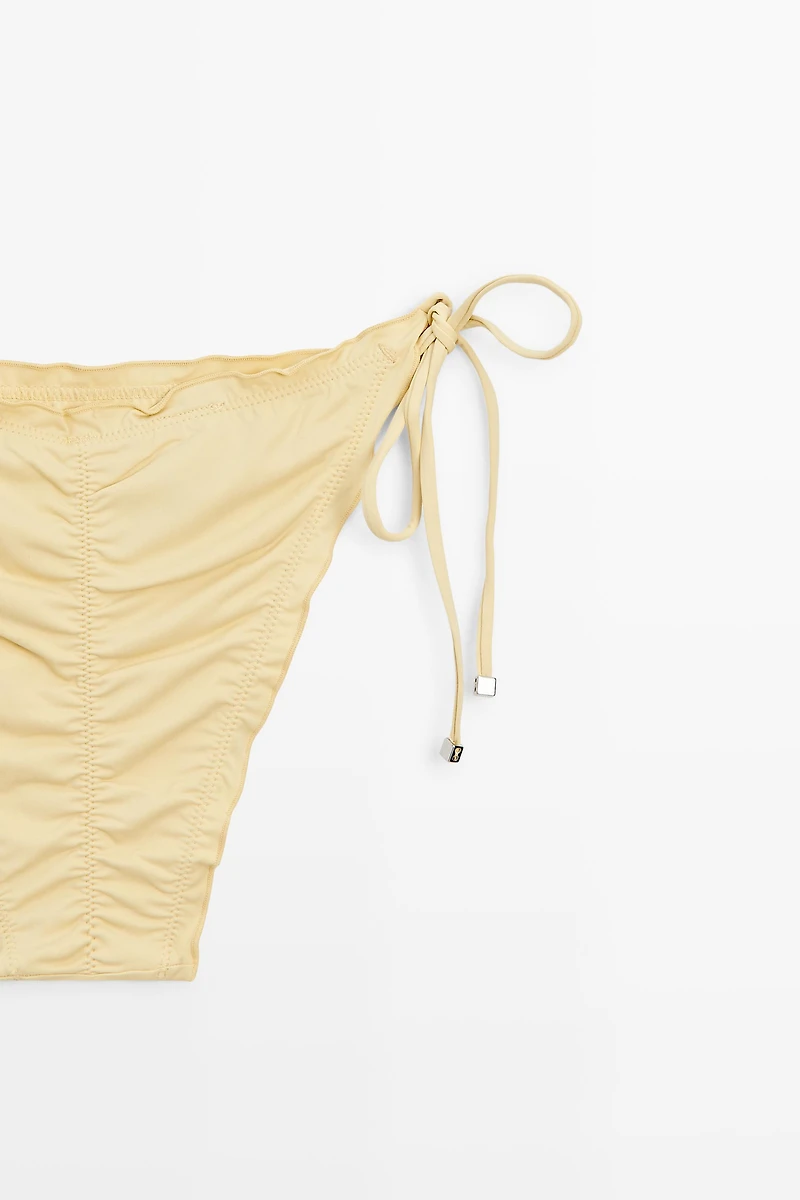 Bas de bikini à volants et liens