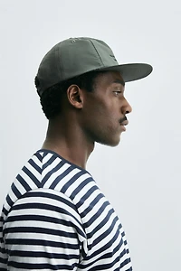 EMBROIDERED FLAT VISOR CAP
