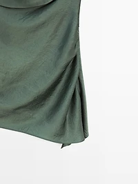 Asymmetric top with draped detail