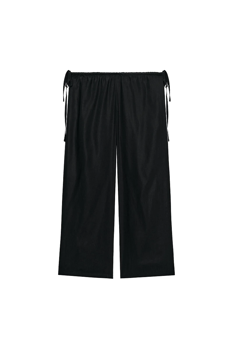 TIED ANKLE-LENGTH FLOWY PANTS