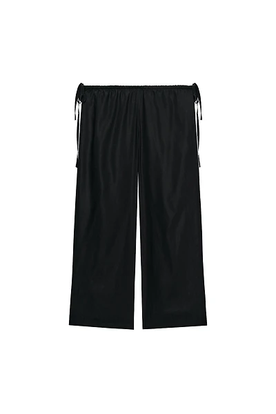 TIED ANKLE-LENGTH FLOWY PANTS
