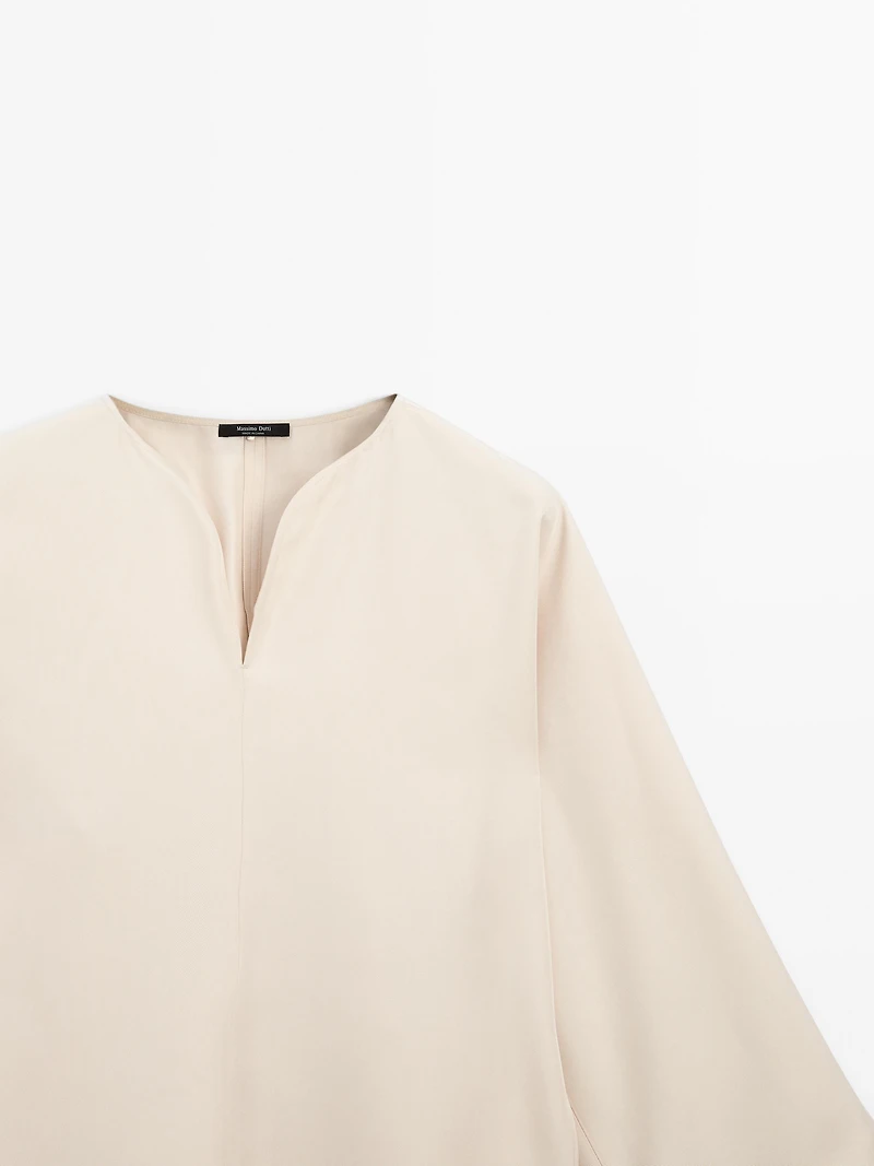 Flowing blouse with slit details