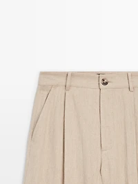 Loose fit high-waist trousers
