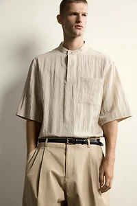 FLOWY POLO SHIRT