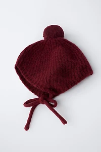 KNIT POMPOM BONNET