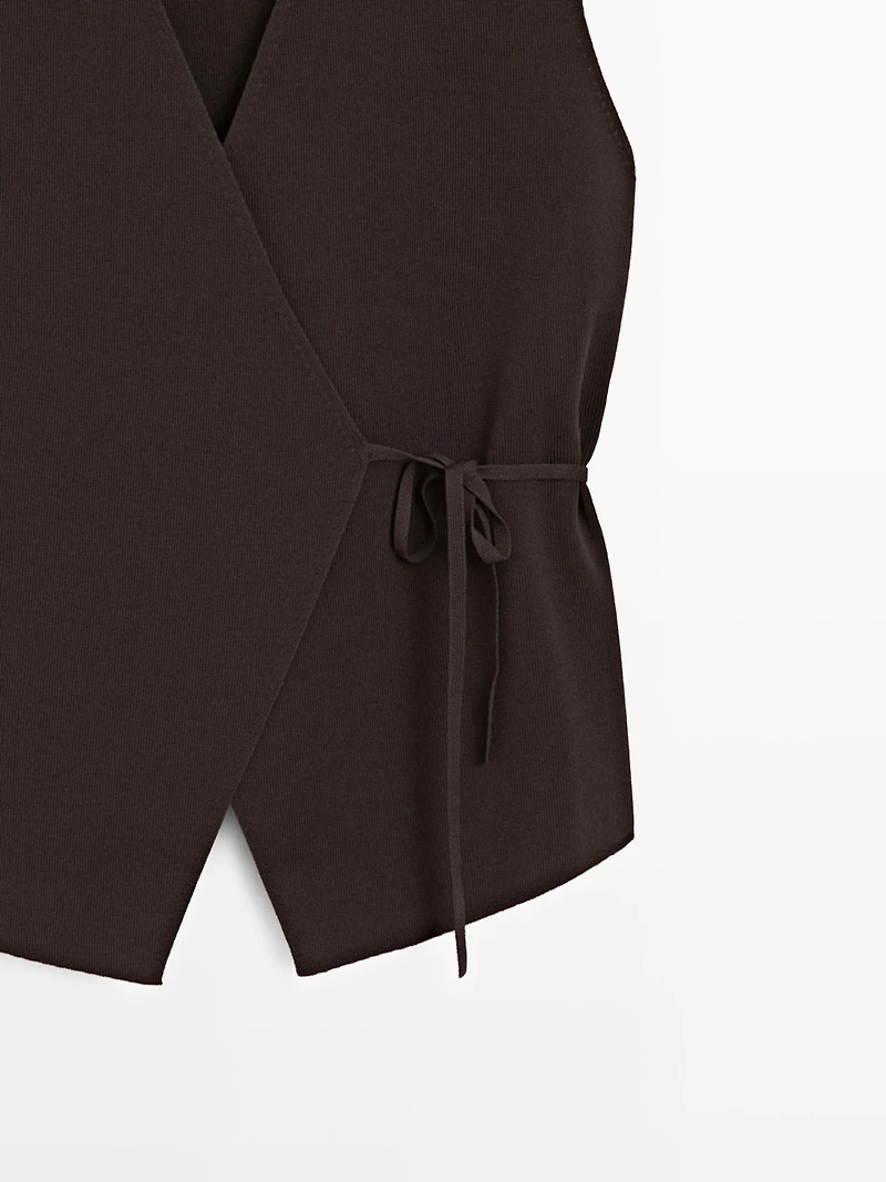 Crossover knit vest with tie detail