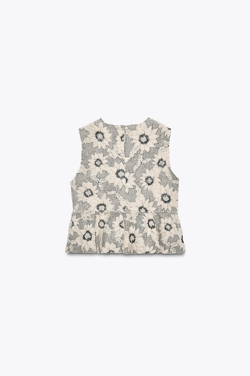 TEXTURED FLORAL PEPLUM TOP