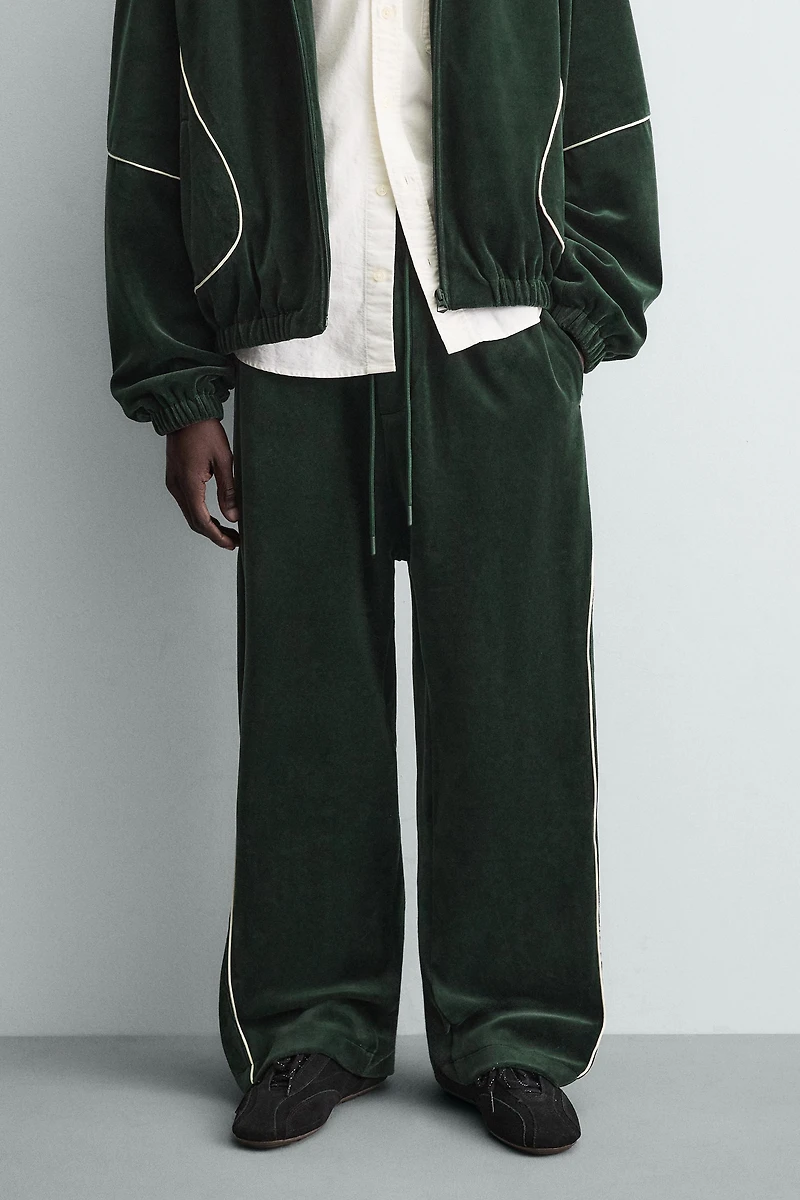 VELOUR PIPED PANTS