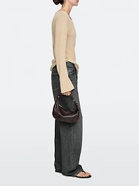 Nappa leather bag with metal buckle