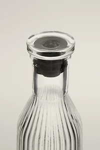 RAISED DESIGN GLASS BOTTLE