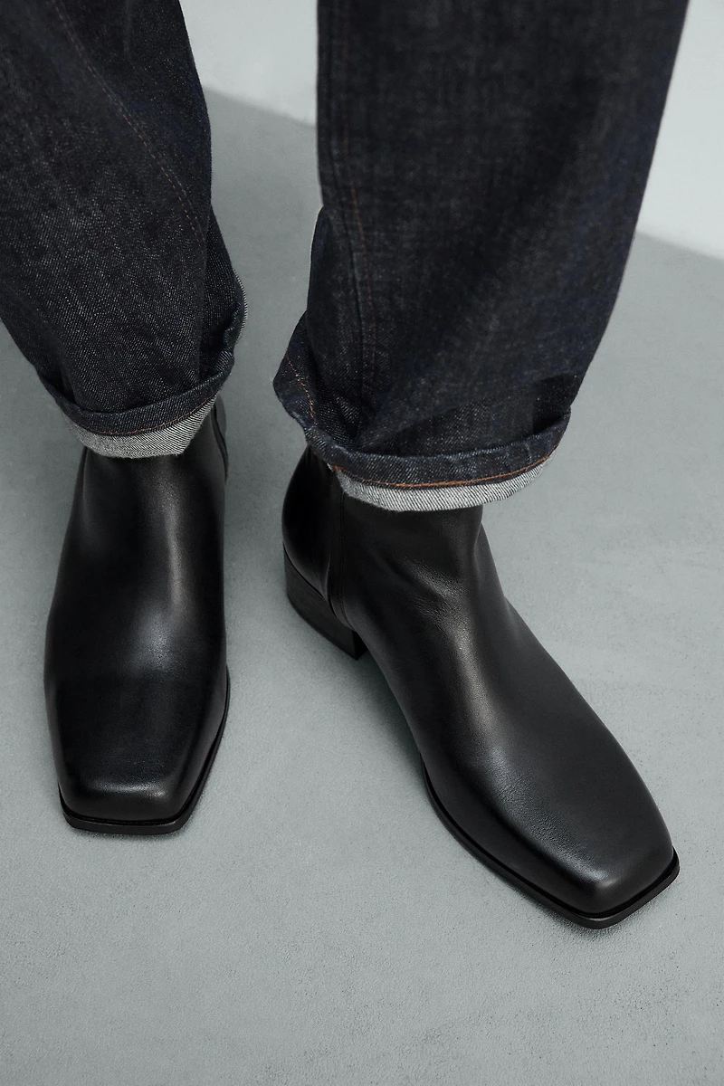 HEELED LEATHER BOOTS