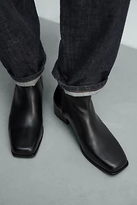 HEELED LEATHER BOOTS