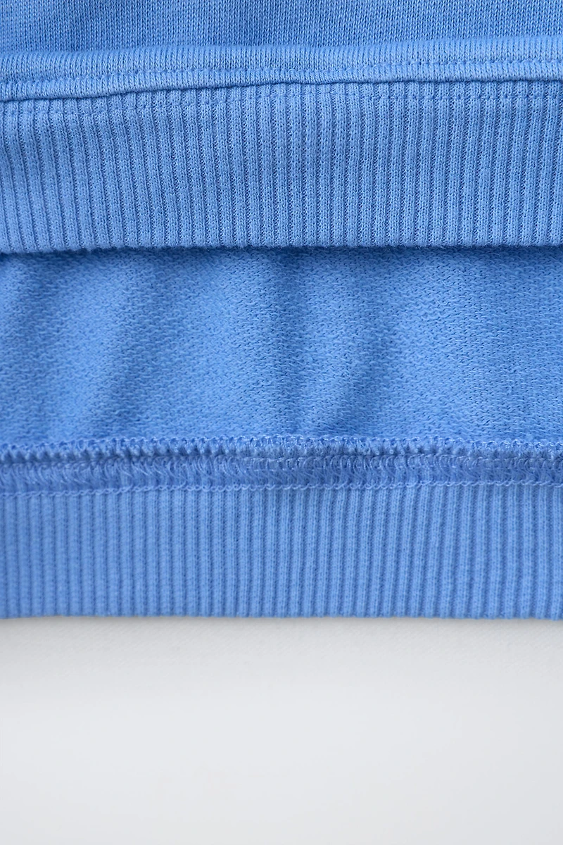 SWEAT SURJETÉ UNI