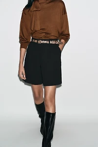 PLEATED BELTED SHORTS