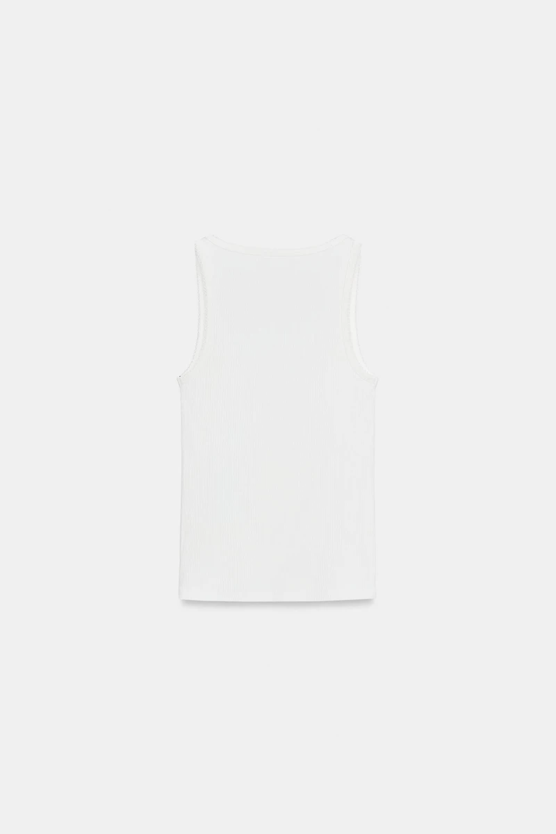 EMBROIDERED FRONT TOP
