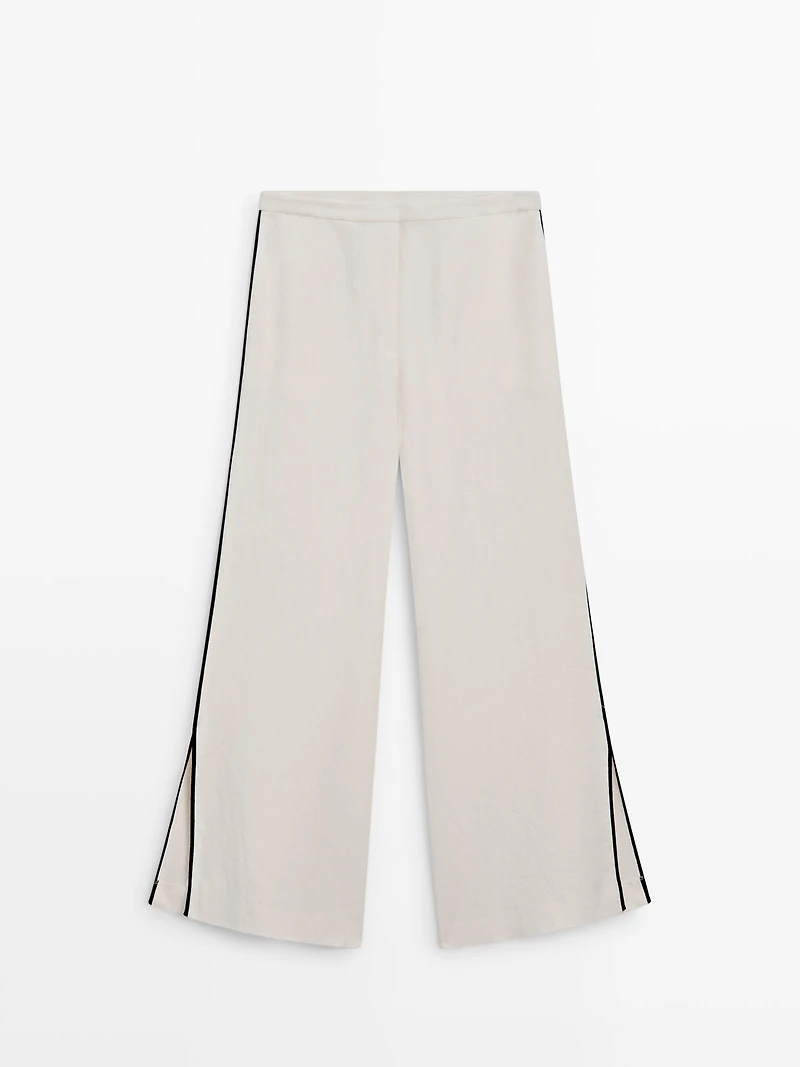 Linen trousers with contrast piping