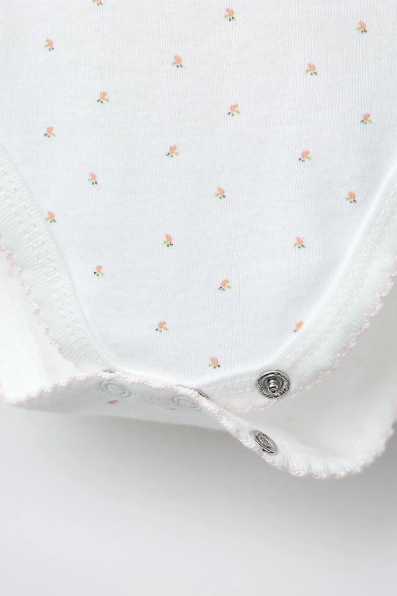 FIVE-PACK OF SHORT-SLEEVED FLORAL BODYSUITS