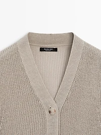 Knit vest with a high neck