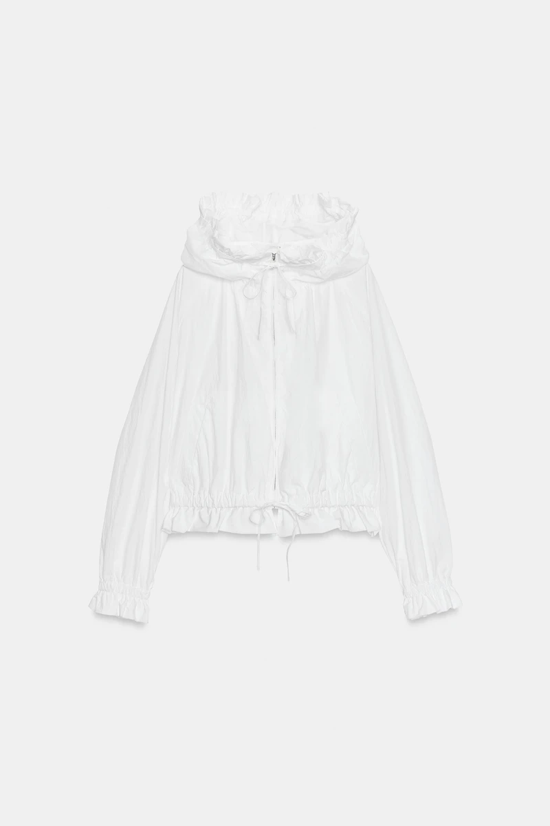 VESTE ZIPPÉE À VOLANTS