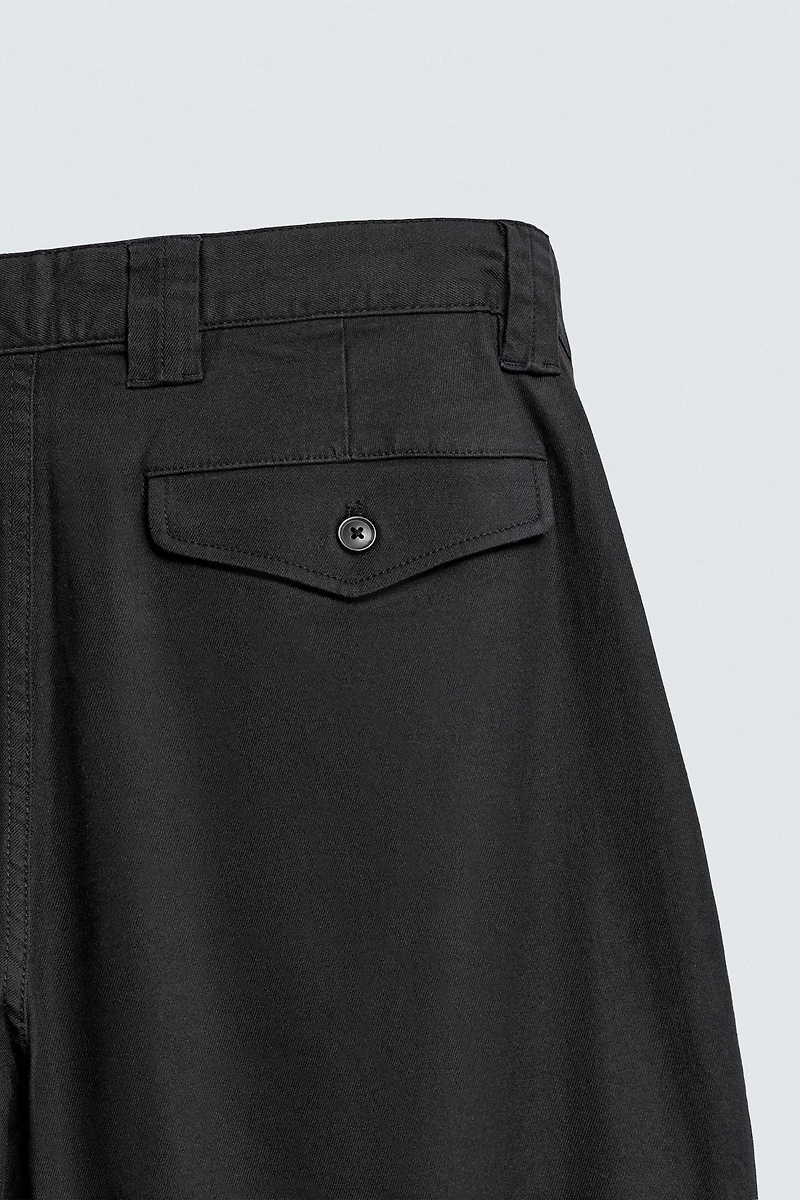 RELAXED FIT PLEATED PANTS