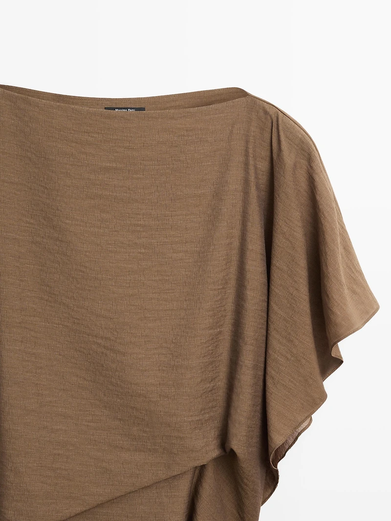 Asymmetric cape-style flowing blouse