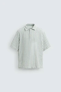 CHEMISE POLO STRUCTURÉE À CHEVRONS