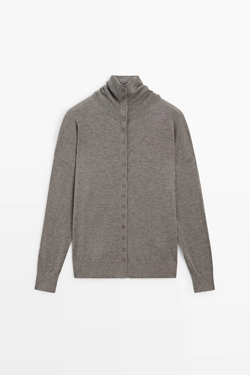 Turtleneck cardigan with button detail