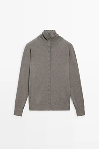Turtleneck cardigan with button detail