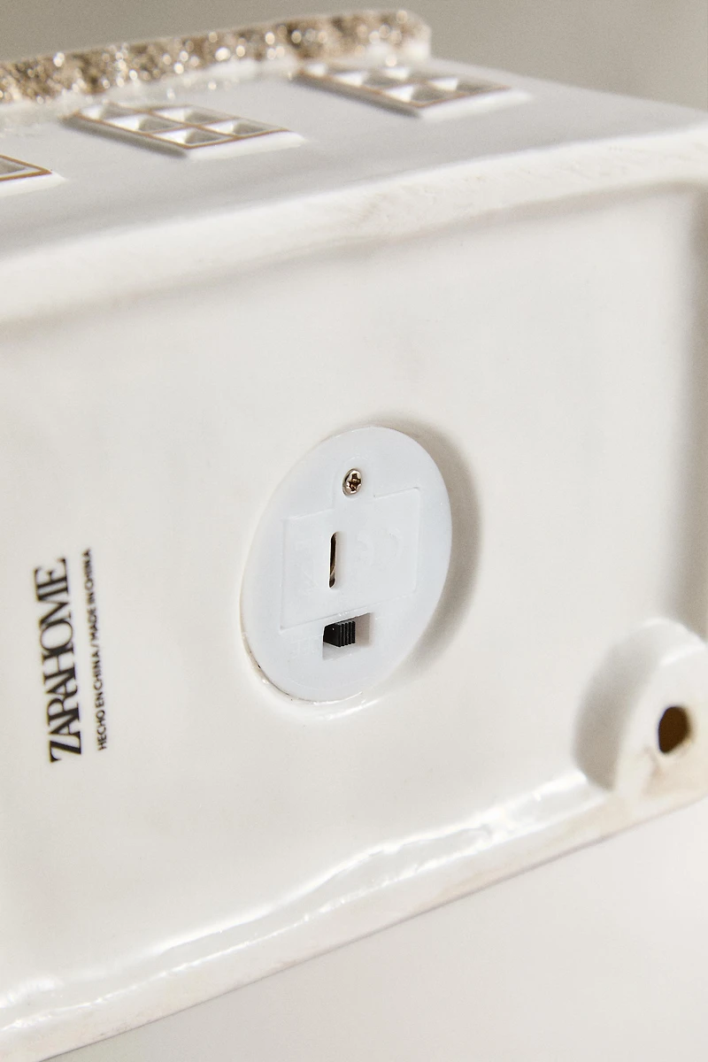 ELONGATED GLITTERY HOUSE CHRISTMAS CERAMIC ORNAMENT