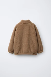 FAUX SHEARLING LABEL SWEATSHIRT