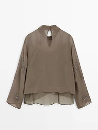Blouse brodée semi-transparente
