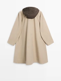 Cape trench coat with hood